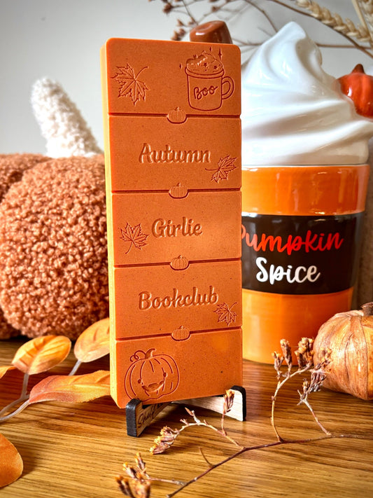 autumn wax melt featuring pumpkins for gifts for book lovers