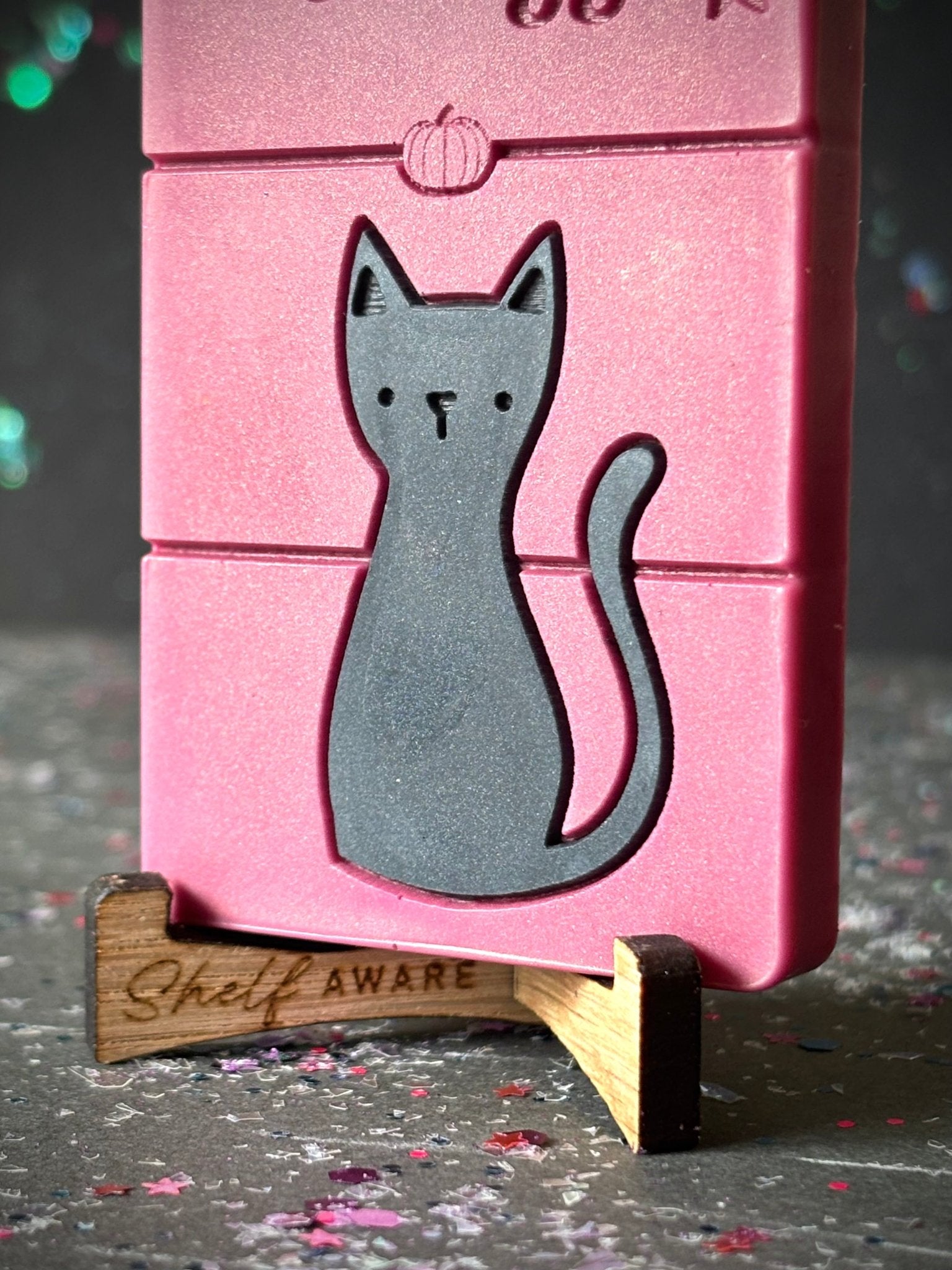 Black Cat Energy wax melt bar for halloween zoomed in