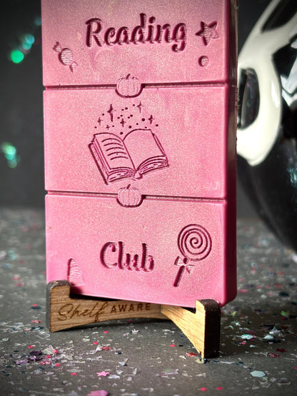Midnight Reading Club book lover wax melt bar zoomed in on stand