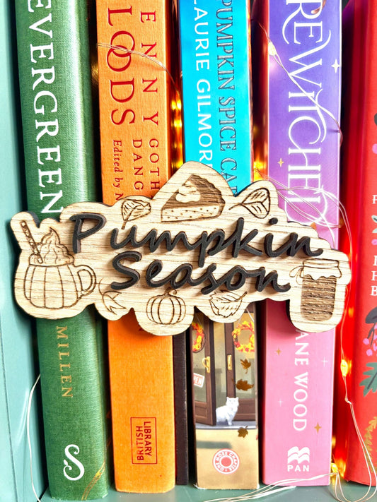 Pumpkin Season Bookshelf Genre Divider on display with books