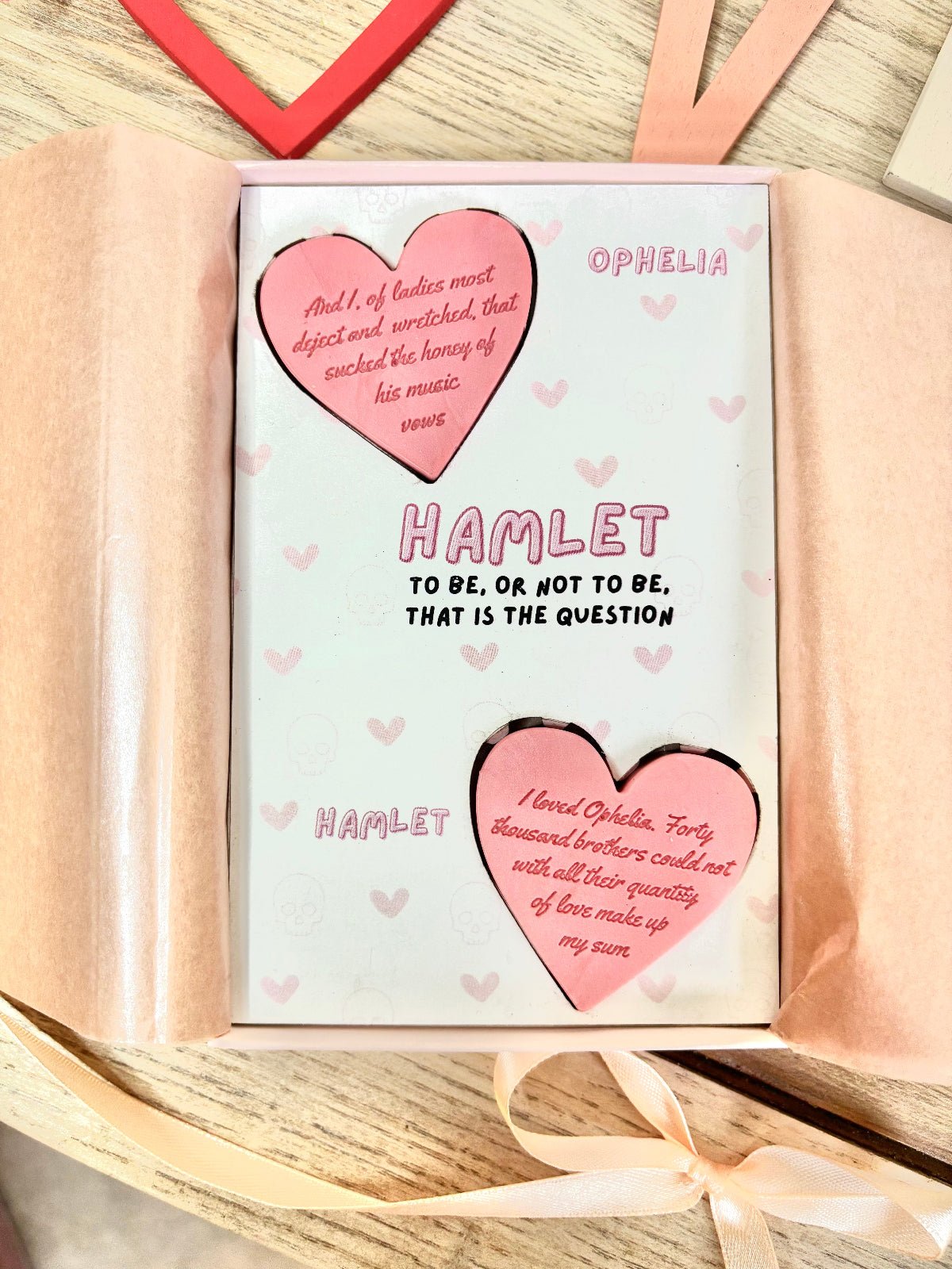 hamlet wax melts for book lovers in a pink gift box. two wax melts with quotes on them from hamlet and ophelia. gifts for classic book lovers and shakespeare. wax melt gift box for valentines day for shakespeare lovers. 