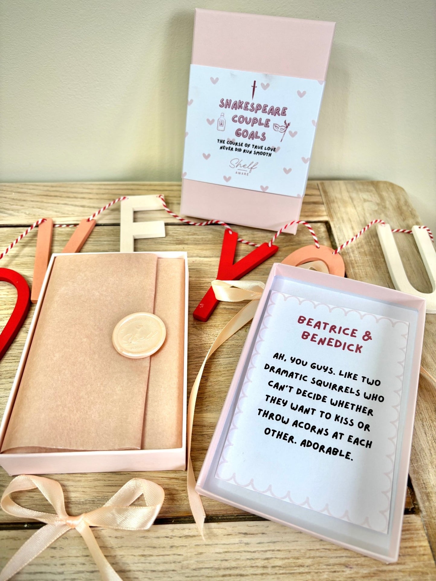 much ado about nothing wax melts for book lovers in a pink gift box. two wax melts with quotes on them from beatrice and benedick. gifts for classic book lovers and shakespeare. 